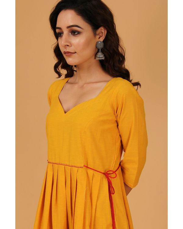 Mustard yellow pleated scalloped dress by The Cotton Staple The