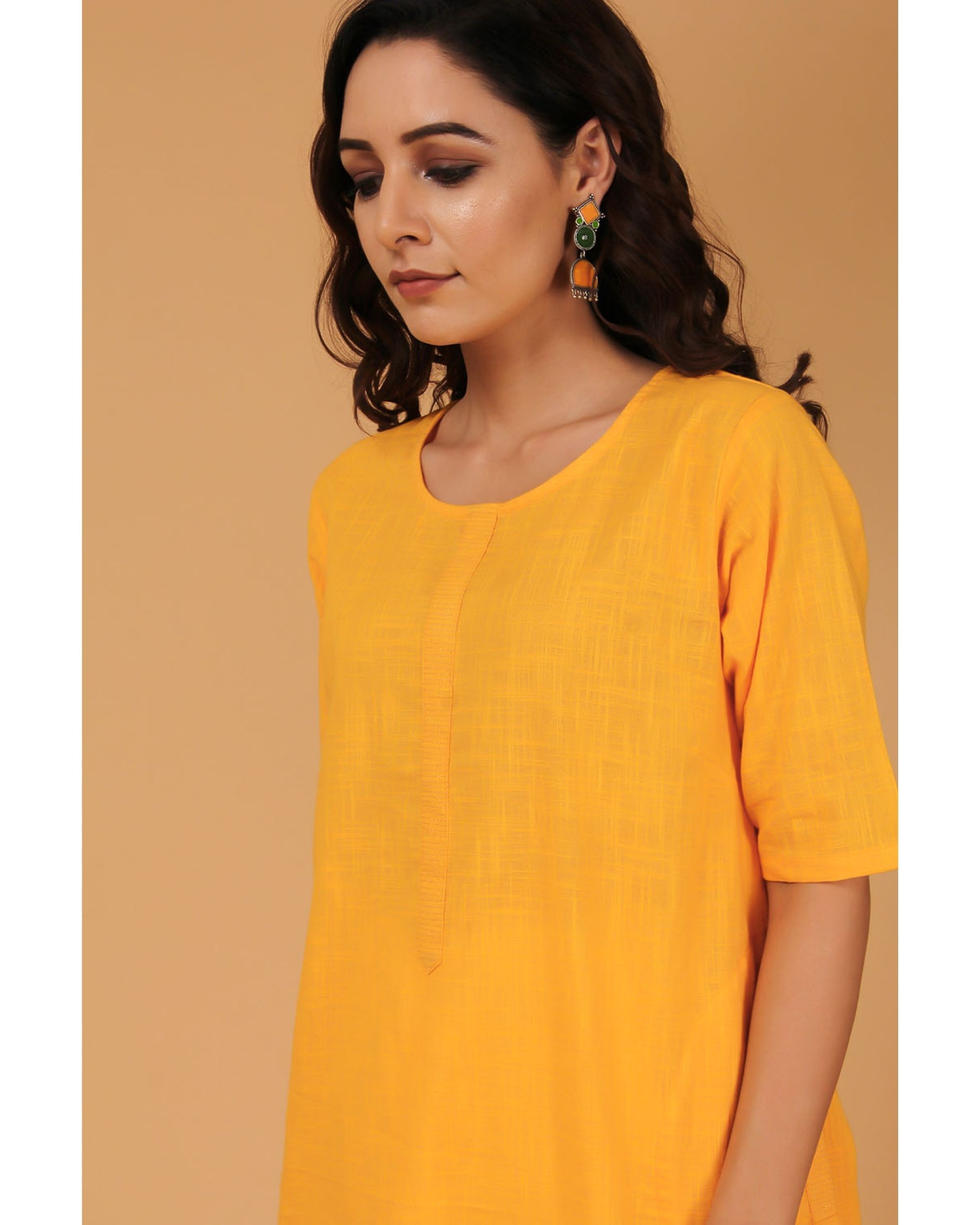 Mustard yellow cotton kurta with pockets by Free Living | The Secret Label