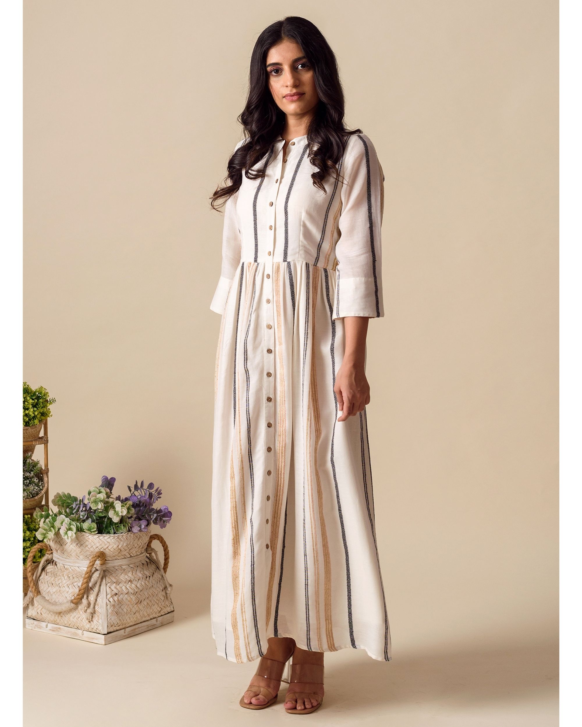 Off white striped button down maxi dress by Kapraaha The Secret Label
