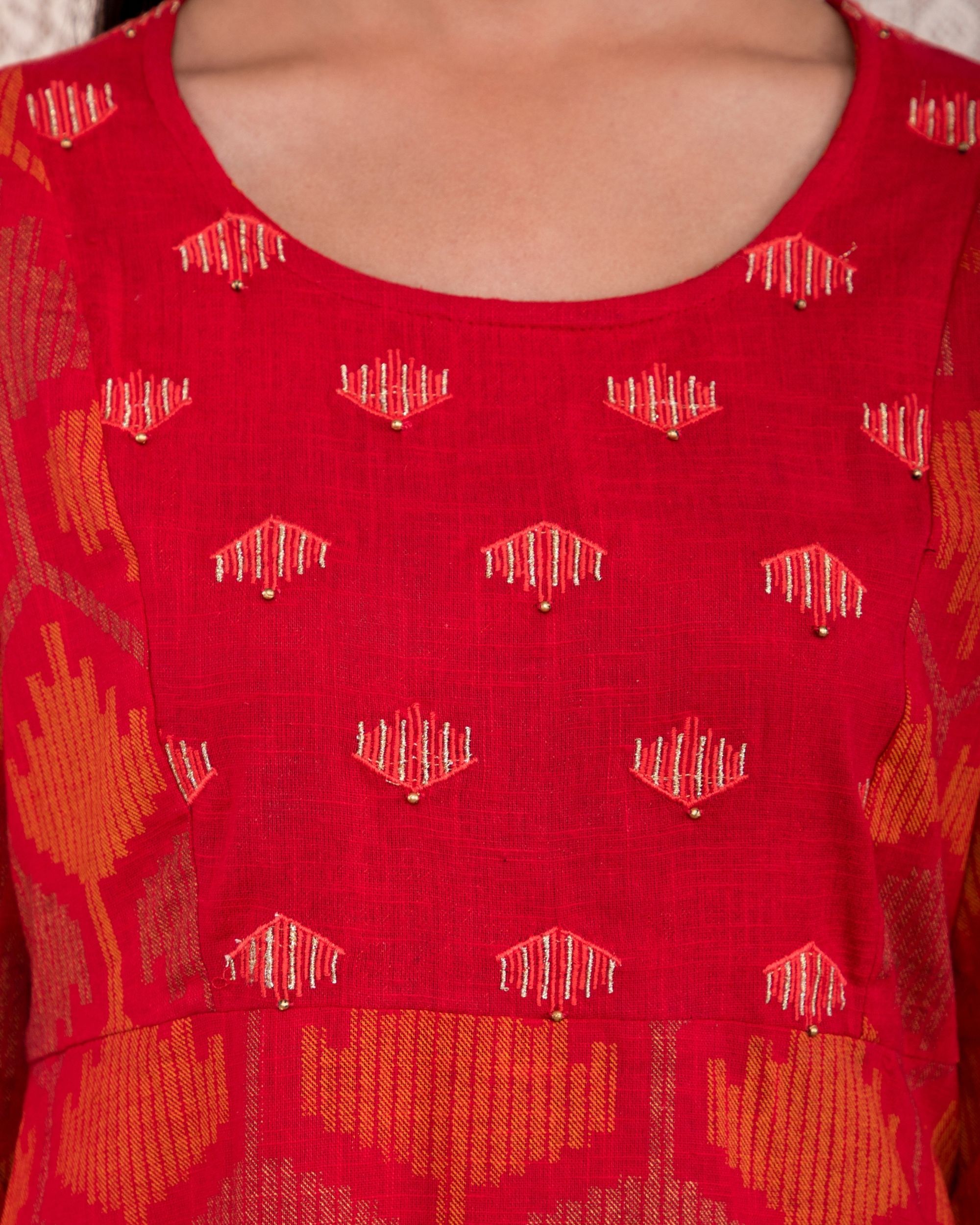 Red embroidered yoke dress by Studio Misri | The Secret Label