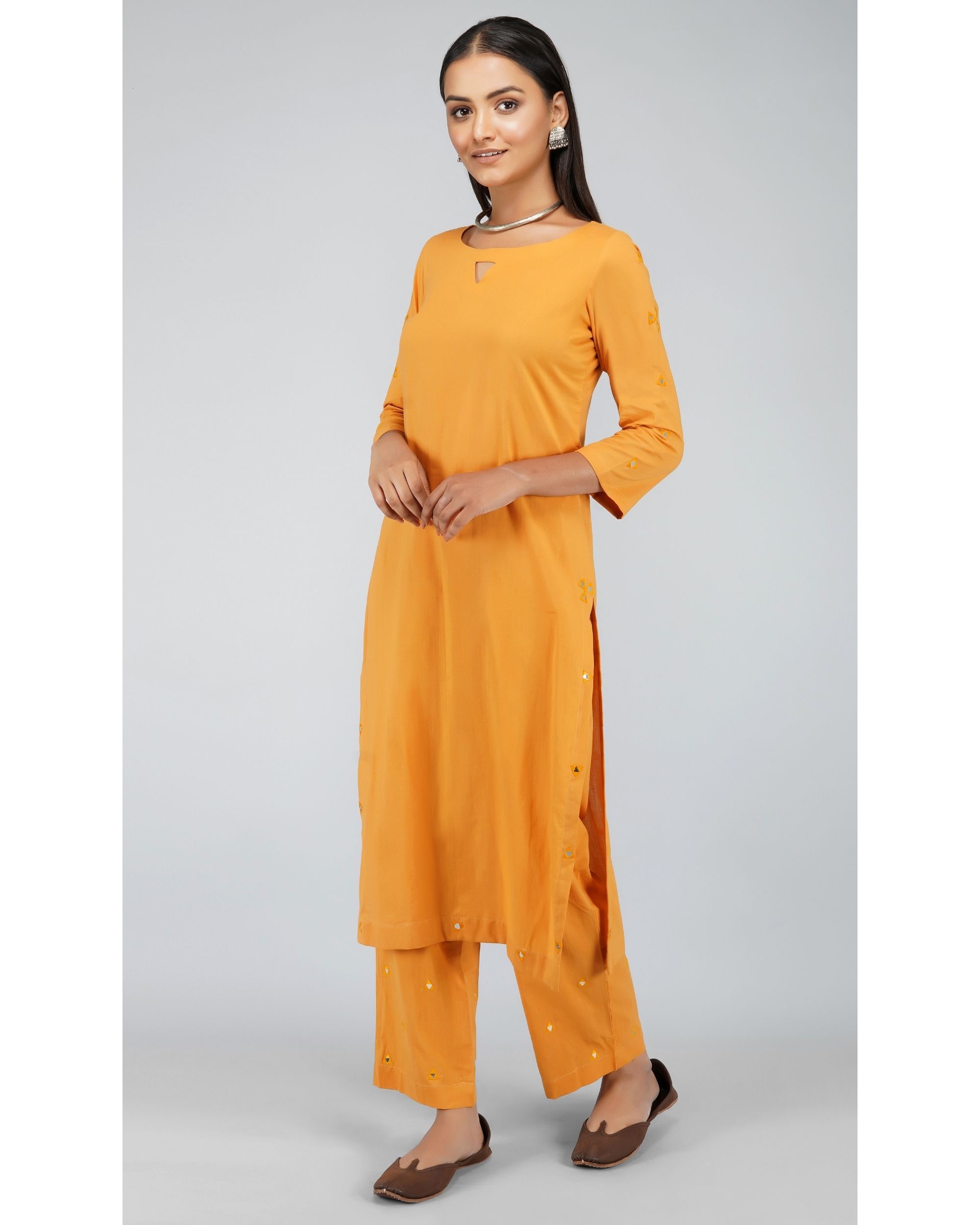 Mustard mirror kurta set set of two by Svaroop Apparel The Secret Label
