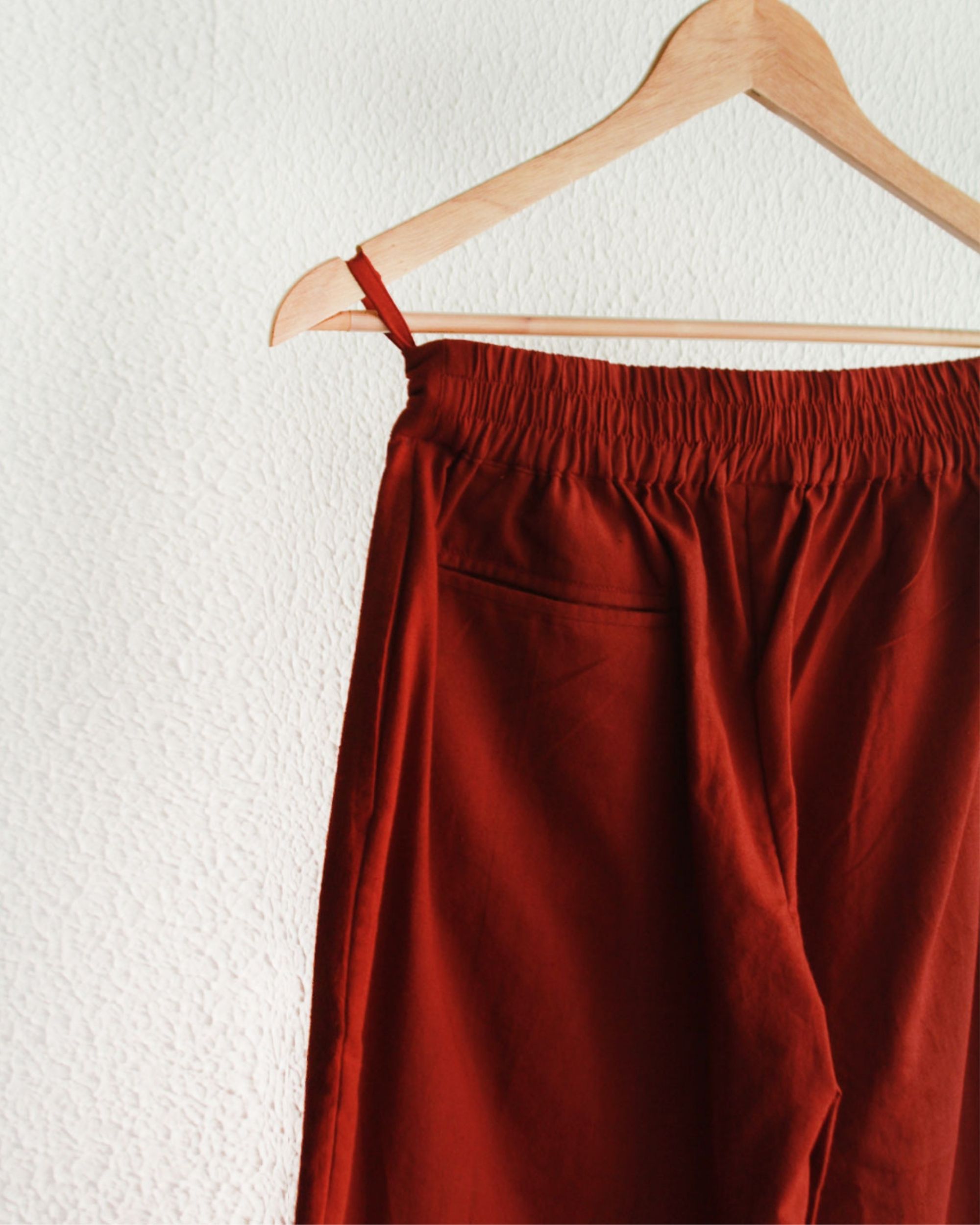 Cherry red pleated pants by Rias | The Secret Label