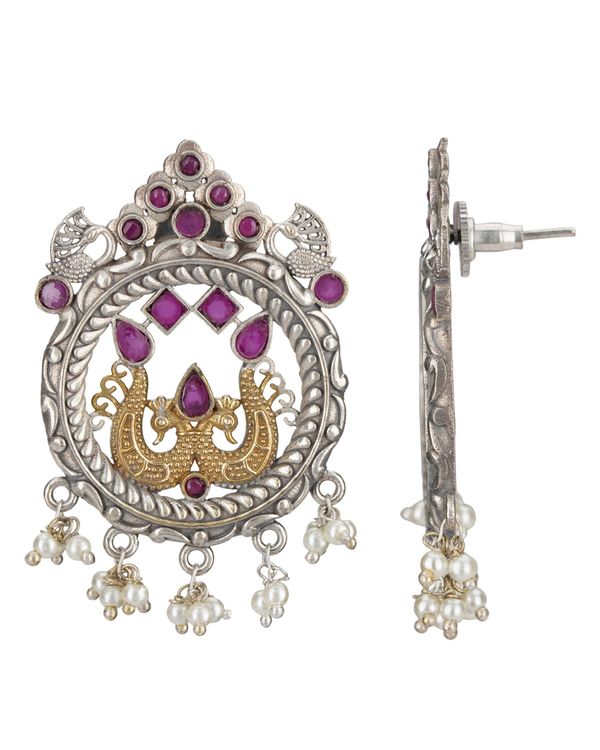 Dual toned peacock engraved earrings 1