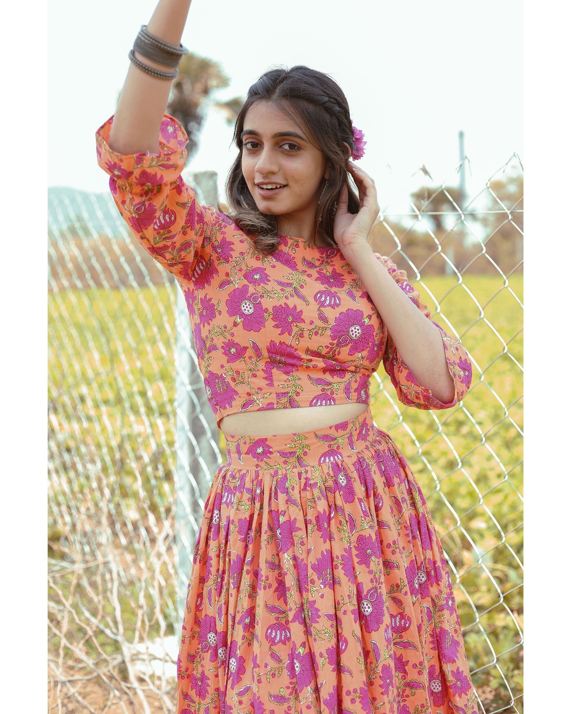 Orange and pink floral printed crop top with skirt - set of two by Kundavai