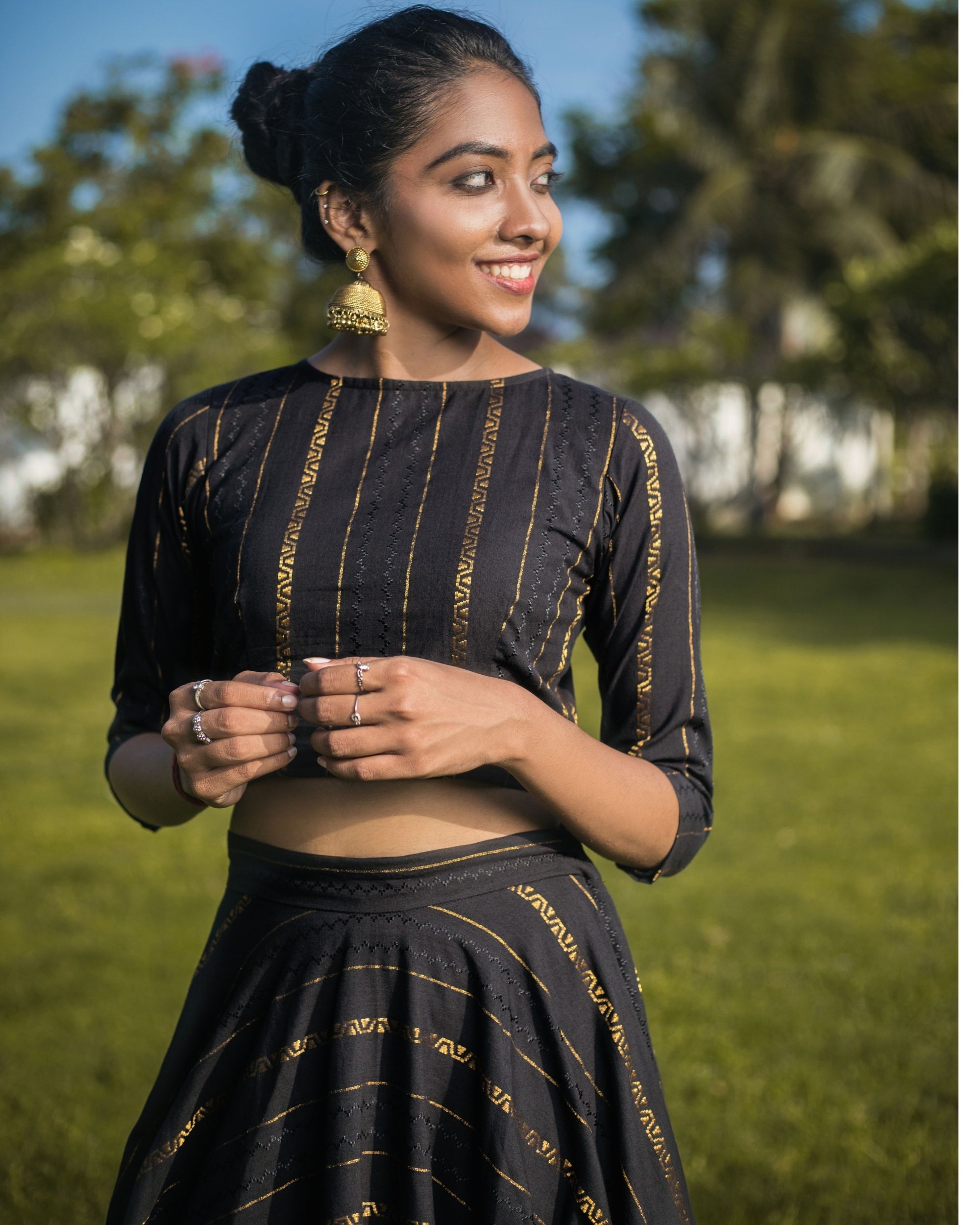 Black zari crop top with skirt set of two by Niram The Secret