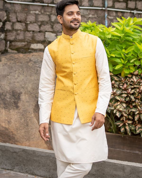 Mustard silk polka dotted nehru jacket with off white kurta and pyjama - set of three 1