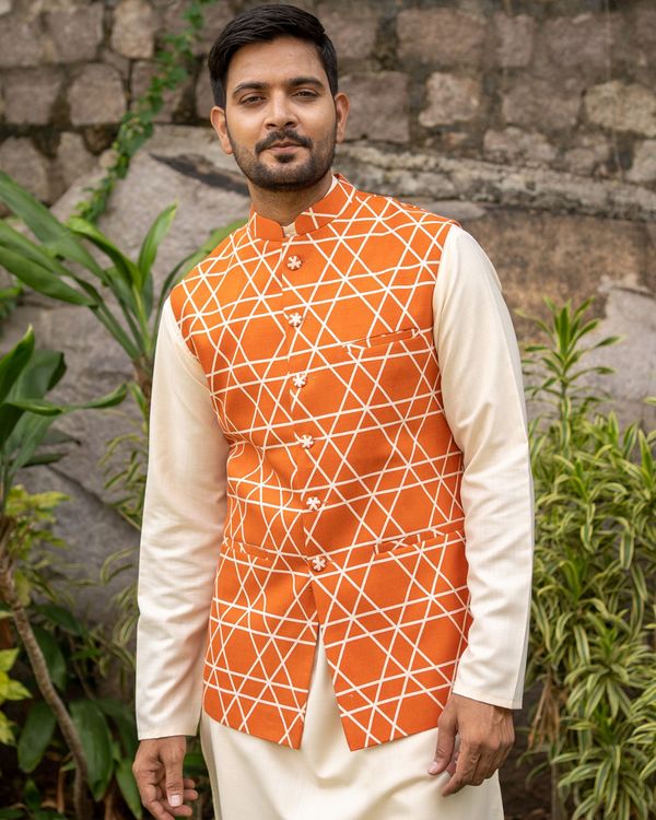 Orange criss cross nehru jacket with off white kurta and pyjama - set of three 1
