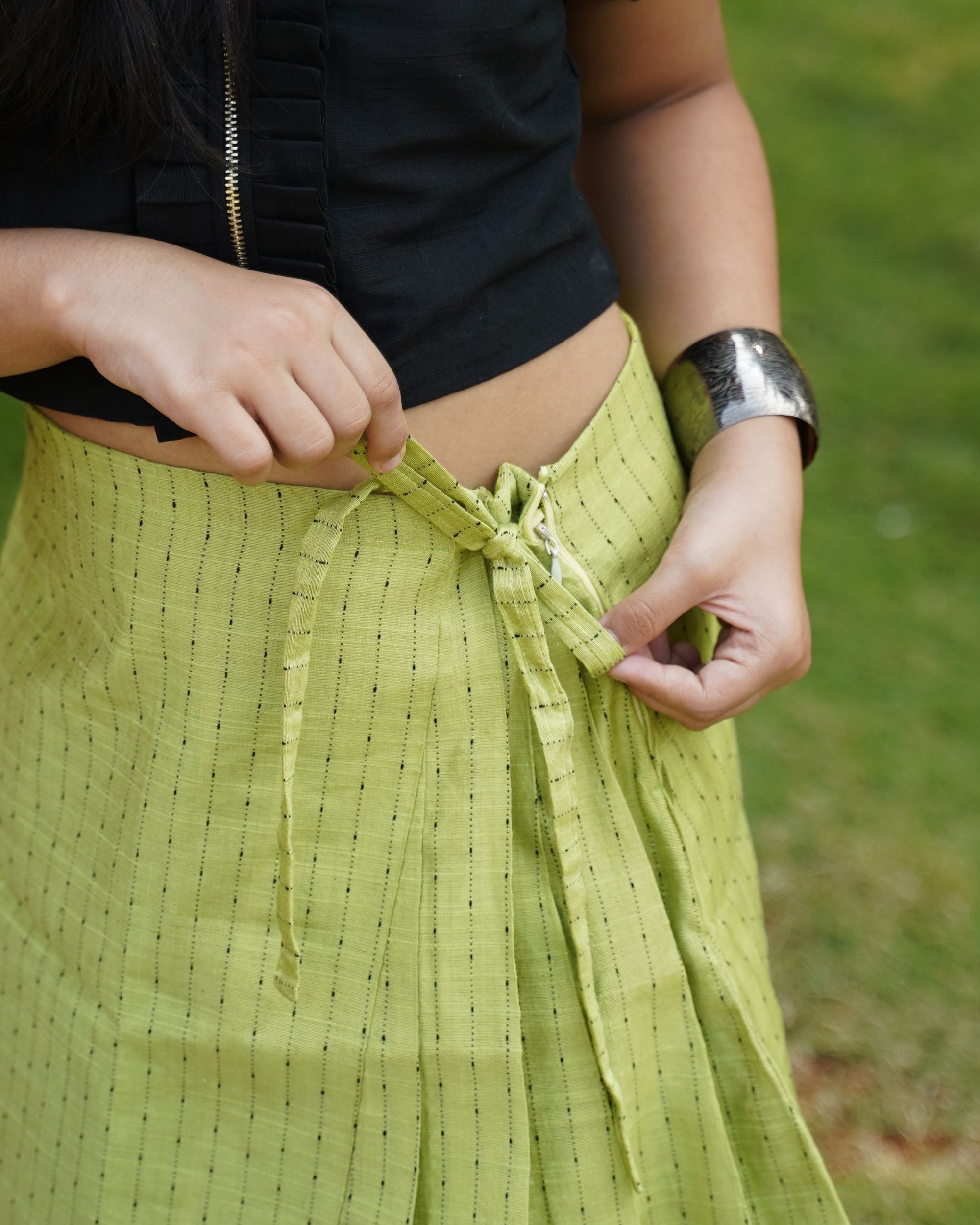 Black ruffled front zipper top and lime pleated skirt -set of two by ...