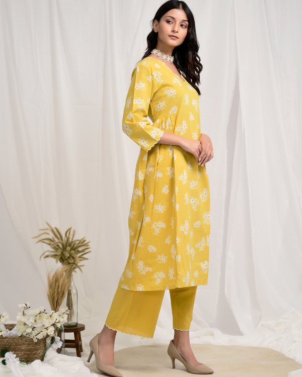 Floral printed mustard yellow kurta with palazzo set of two by Charu