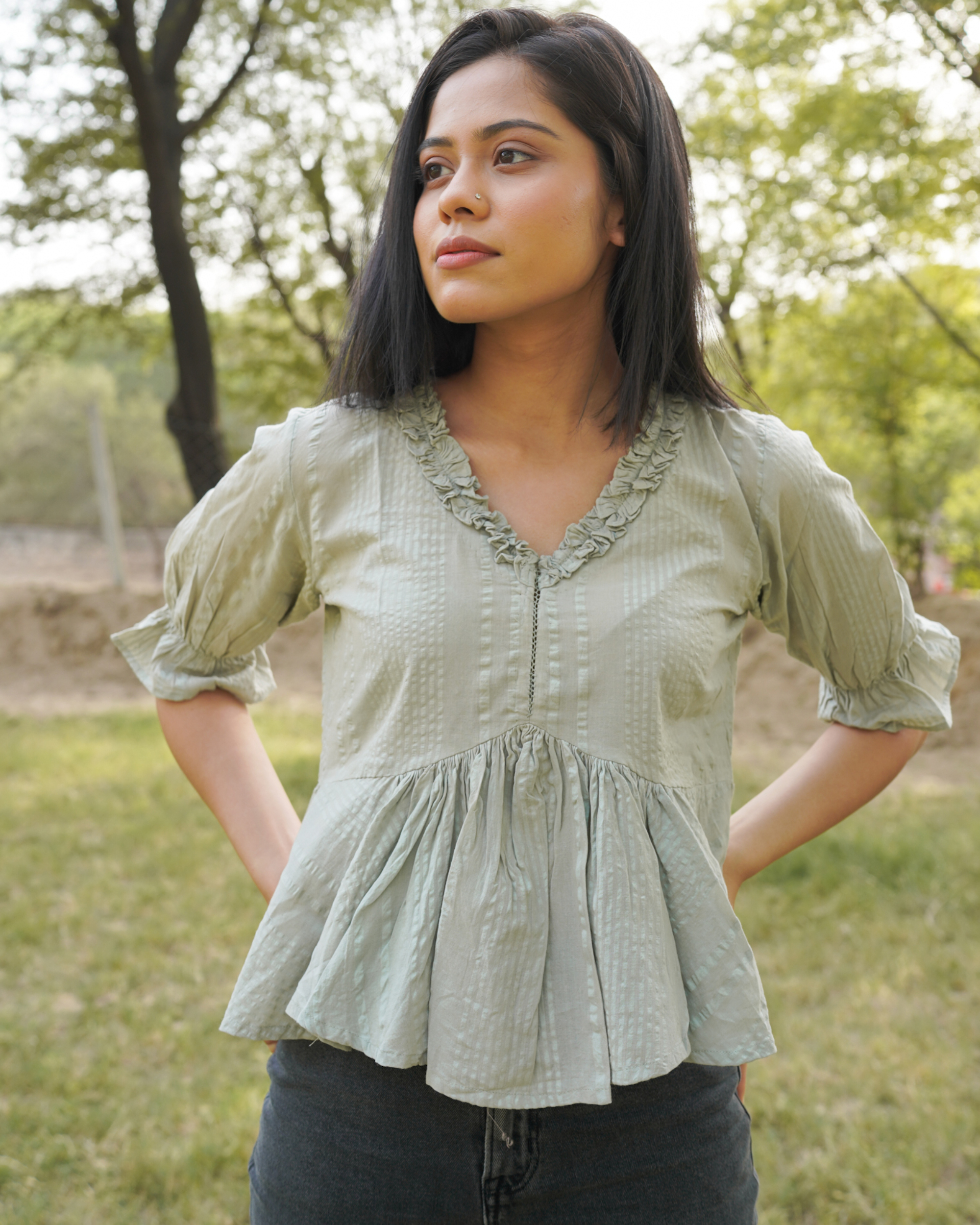 Sage green ruffle neck top by Increscent