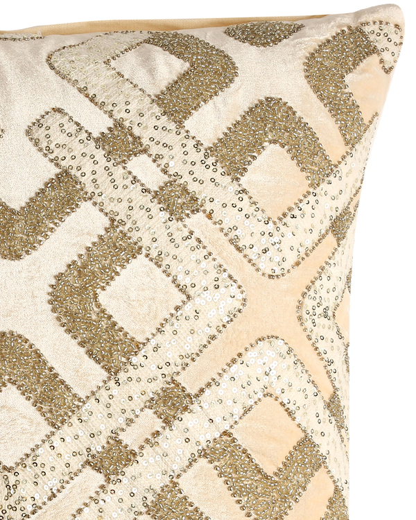 Beige accent cushion cover with geometric embellishments 2