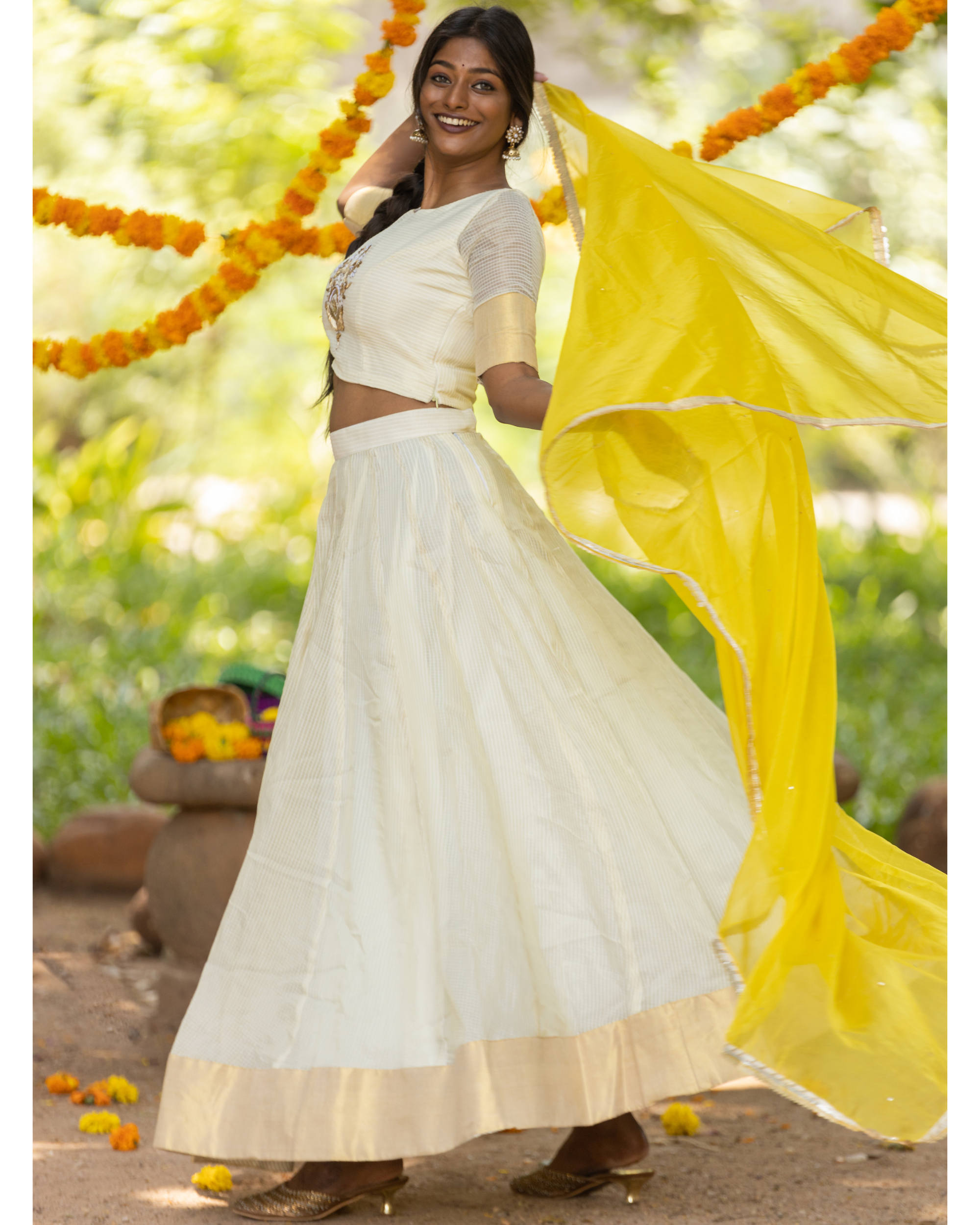 Sunshine Yellow Bridal Net Lehenga with Fancy Cut Choli and Butterfly  Dupatta Sleeves Heavily Embellished in White-Silvery Rosette Sequins - Aara  Couture