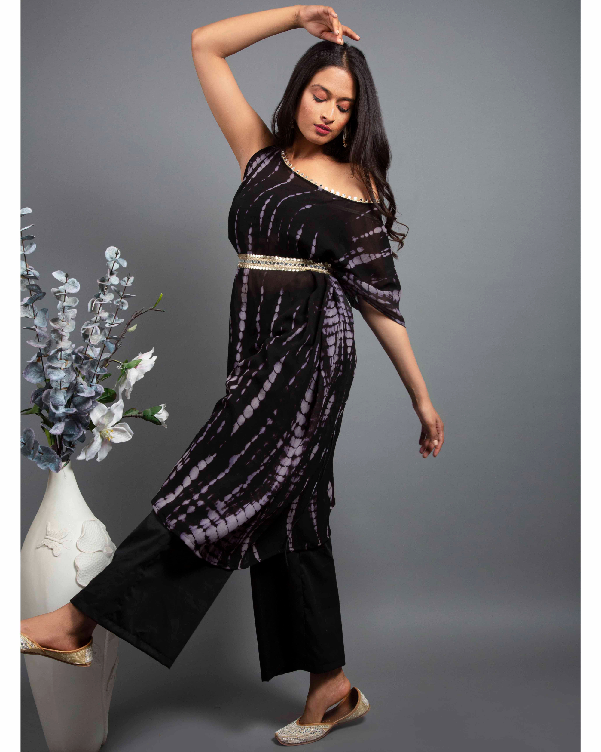 Malaika Arora's printed one-shoulder kaftan may just become your holiday  uniform | VOGUE India