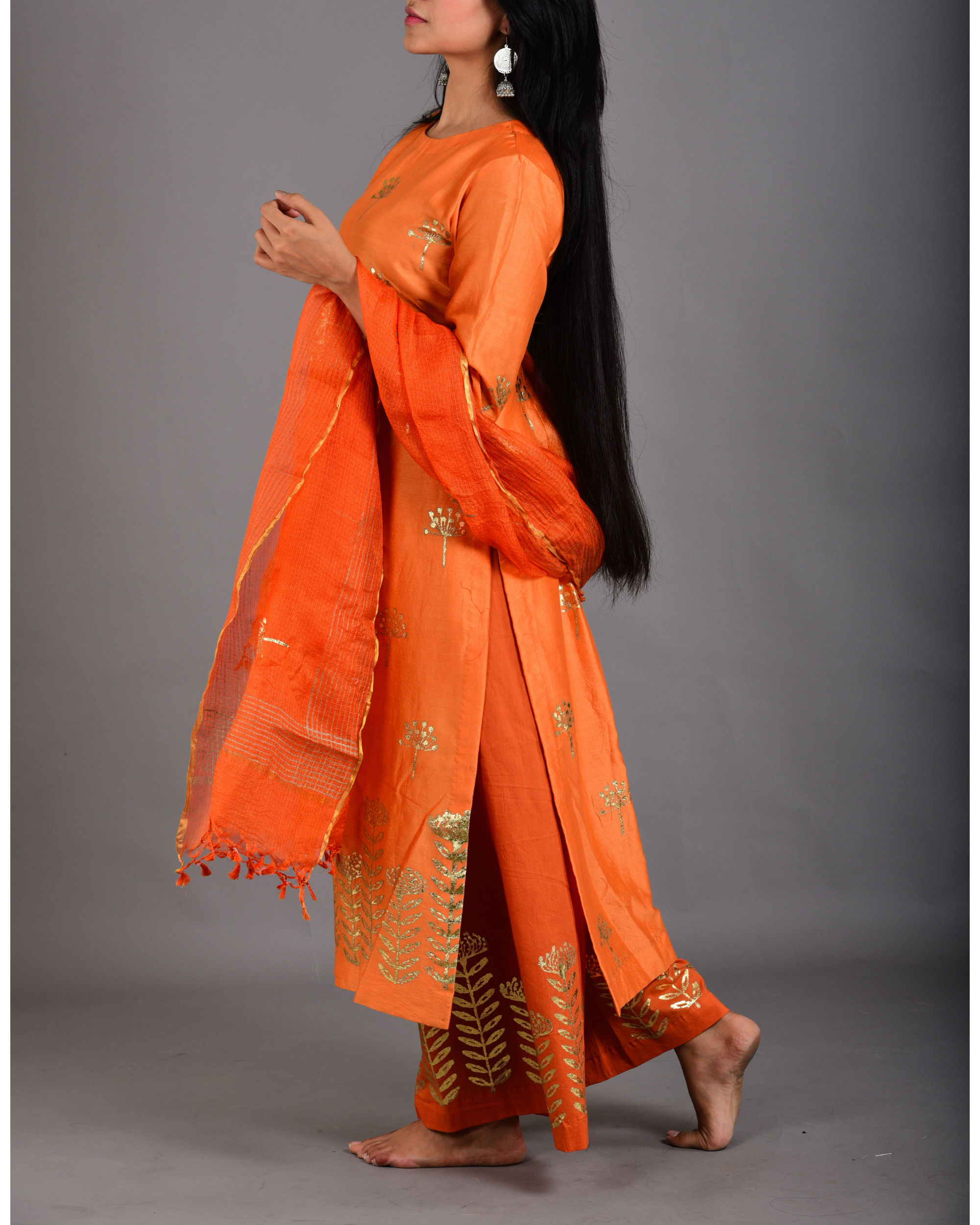 Tangerine orange marigold suit set by Purple Panchi The Secret Label