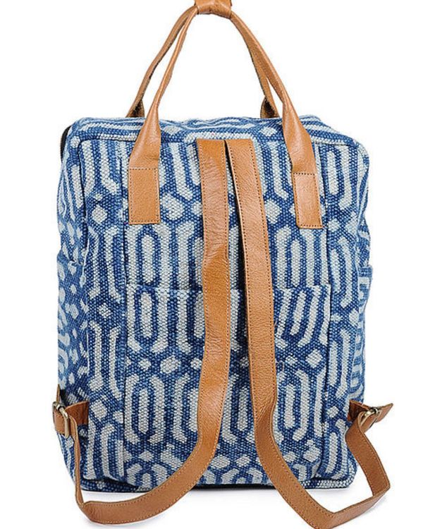 Indigo hand-printed cotton rug and leather backpack 1