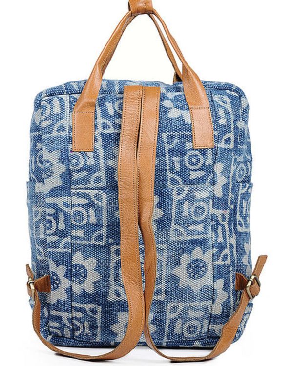 Indigo floral printed cotton rug and leather backpack 1