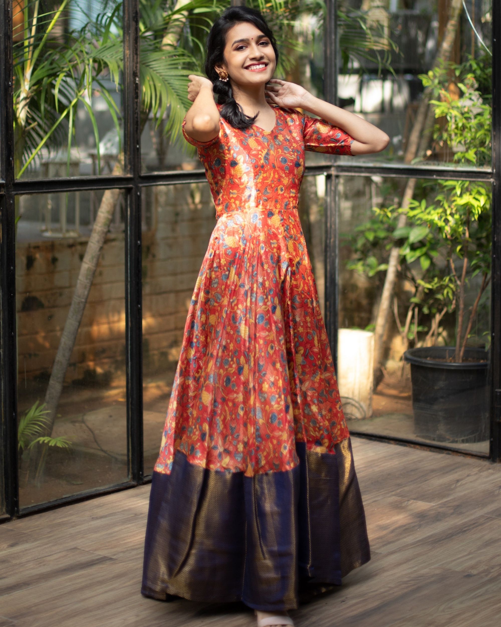 Red kalamkari silk dress with blue brocade border by Athira Designs ...