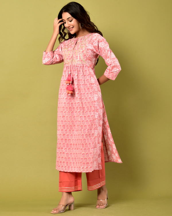 Blush pink printed kurta with pants set of two by Naksh The Secret