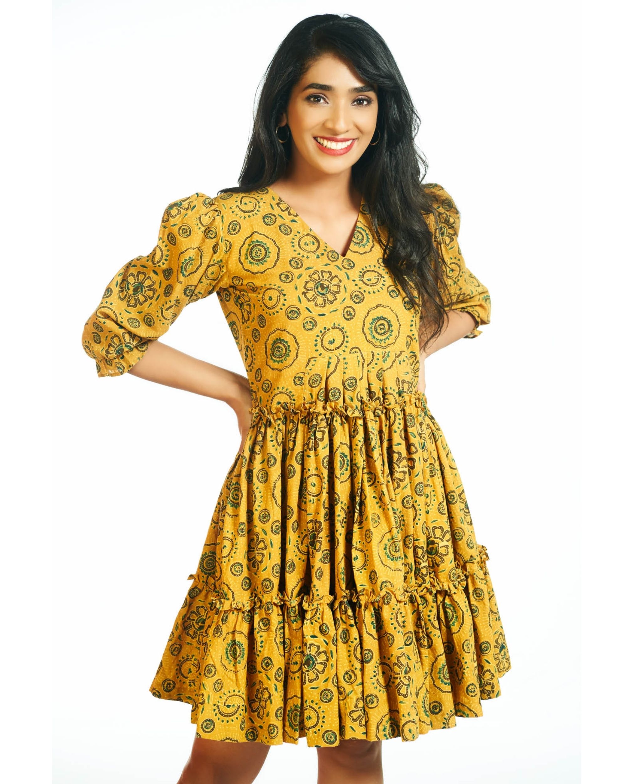 Mustard abstract motifs printed tier dress by Threeness | The Secret Label