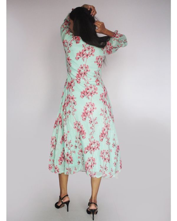 Green and pink floral printed flared dress by Threeness | The Secret Label