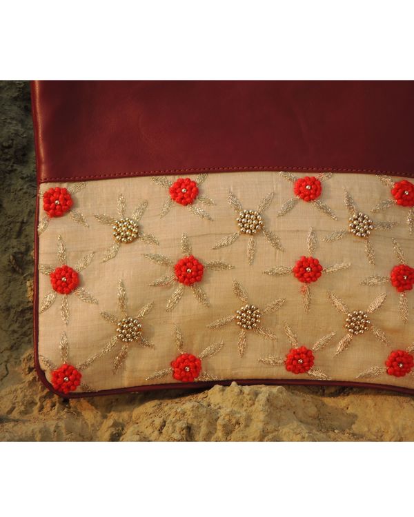Beige and orange floral moti embroidered leather clutch 1