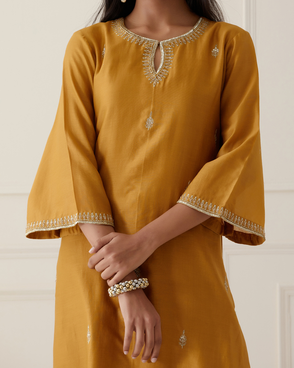 Mustard yellow Embroidered kurta with palazzo set of two by Ikshita