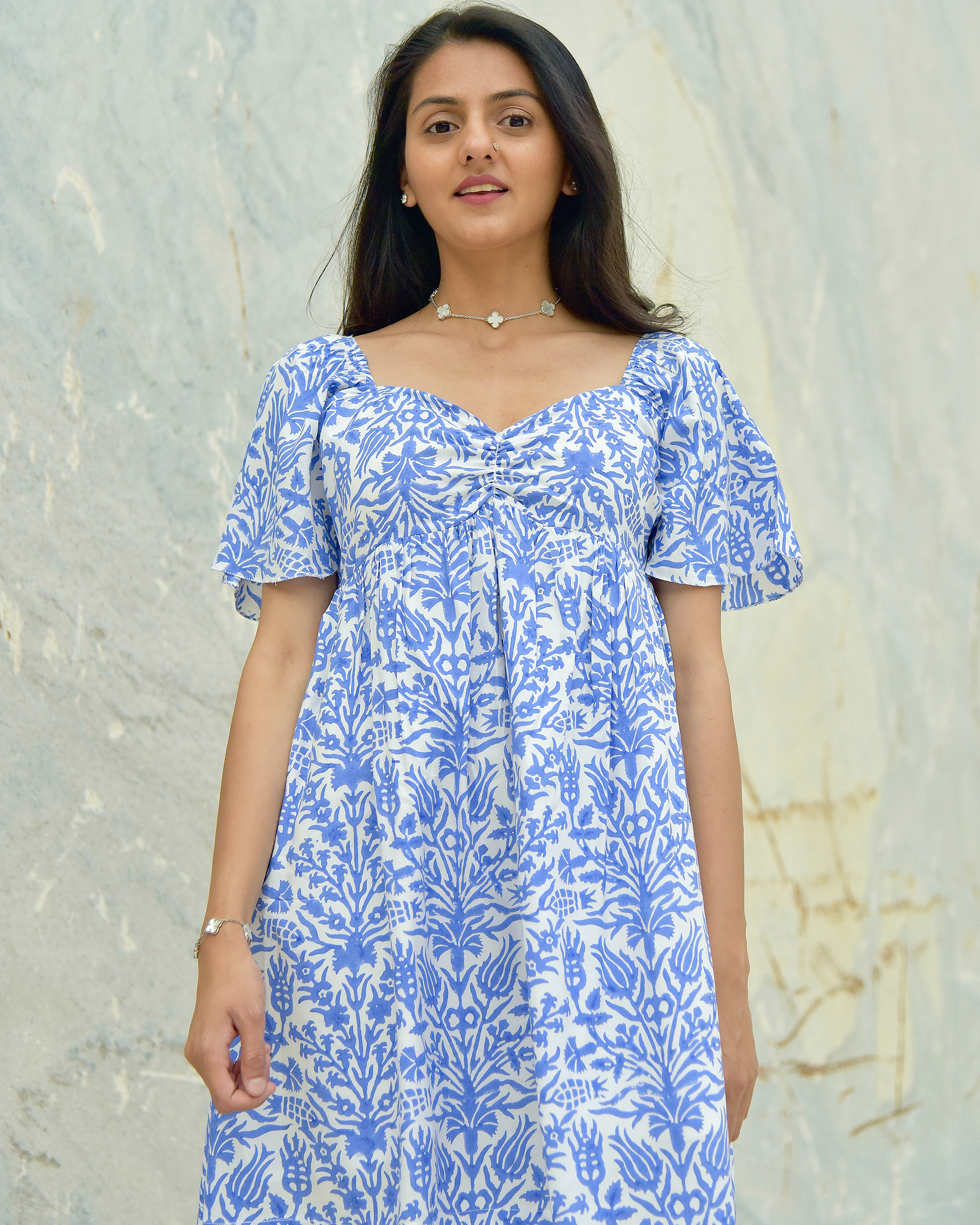 Blue floral printed flared dress by Oodeypore