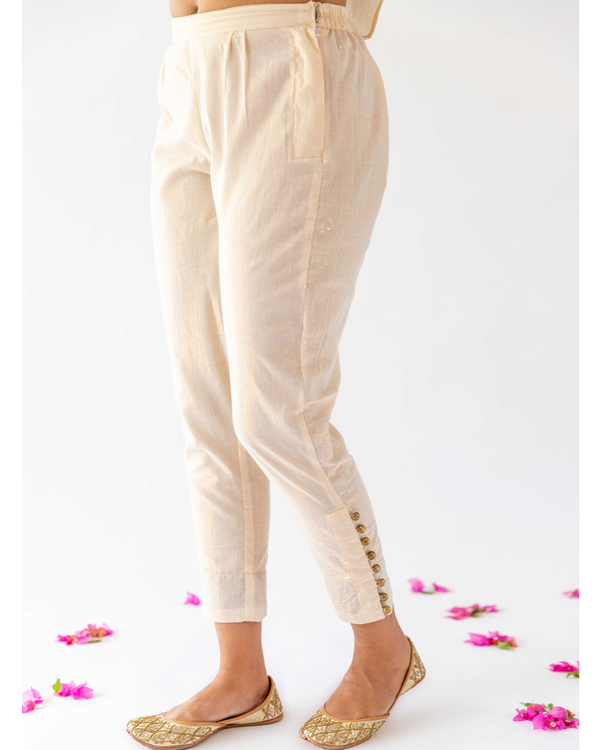 Ivory tappered pants with buttons detailing 3
