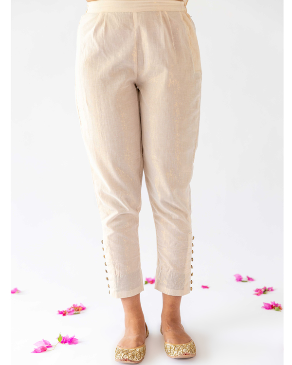 Ivory tappered pants with buttons detailing 2