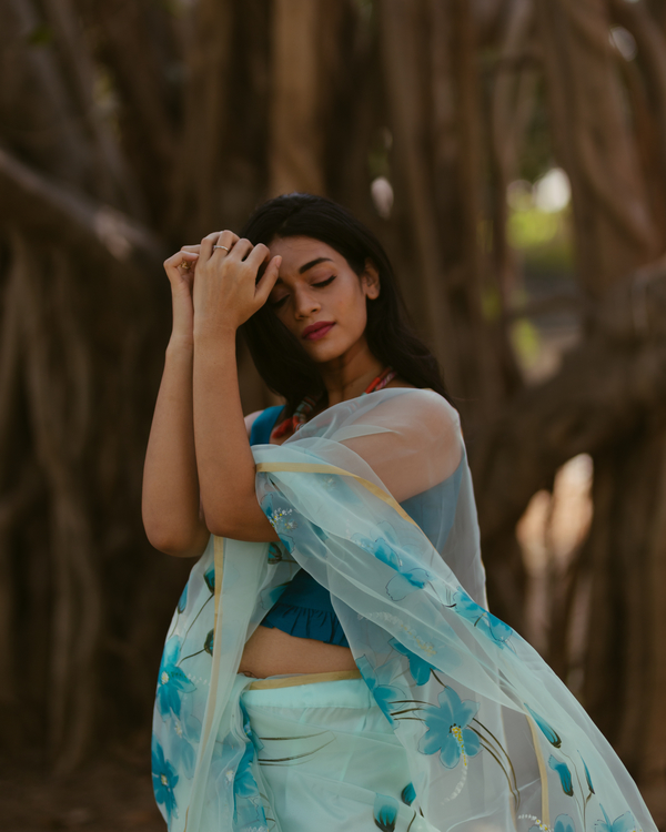 Turquoise floral hand painted organza saree 1