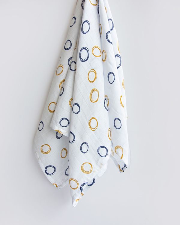 Blue and yellow doodled muslin swaddle 1