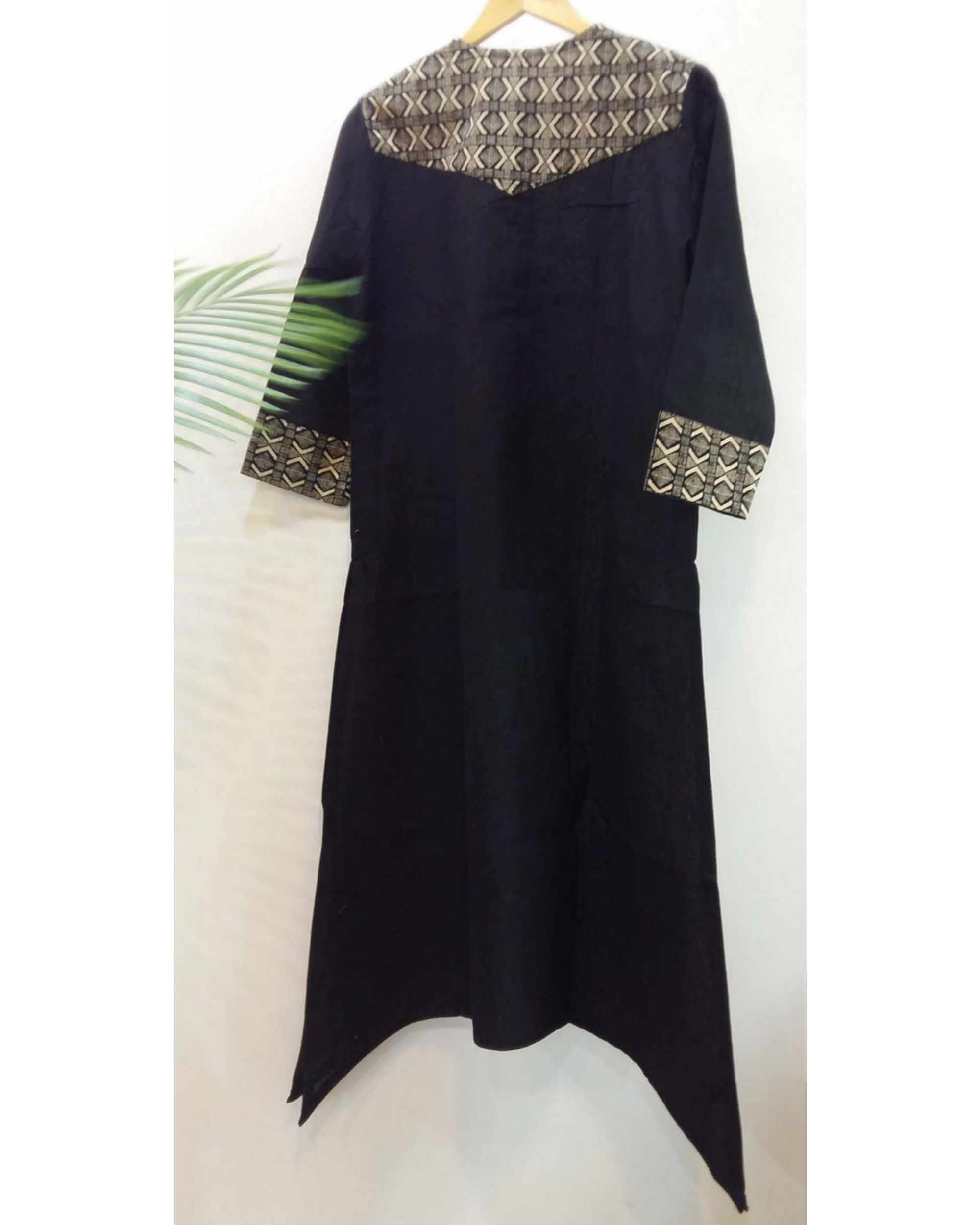 Black asymmetrical hemline kurta by Sonal Kabra | The Secret Label