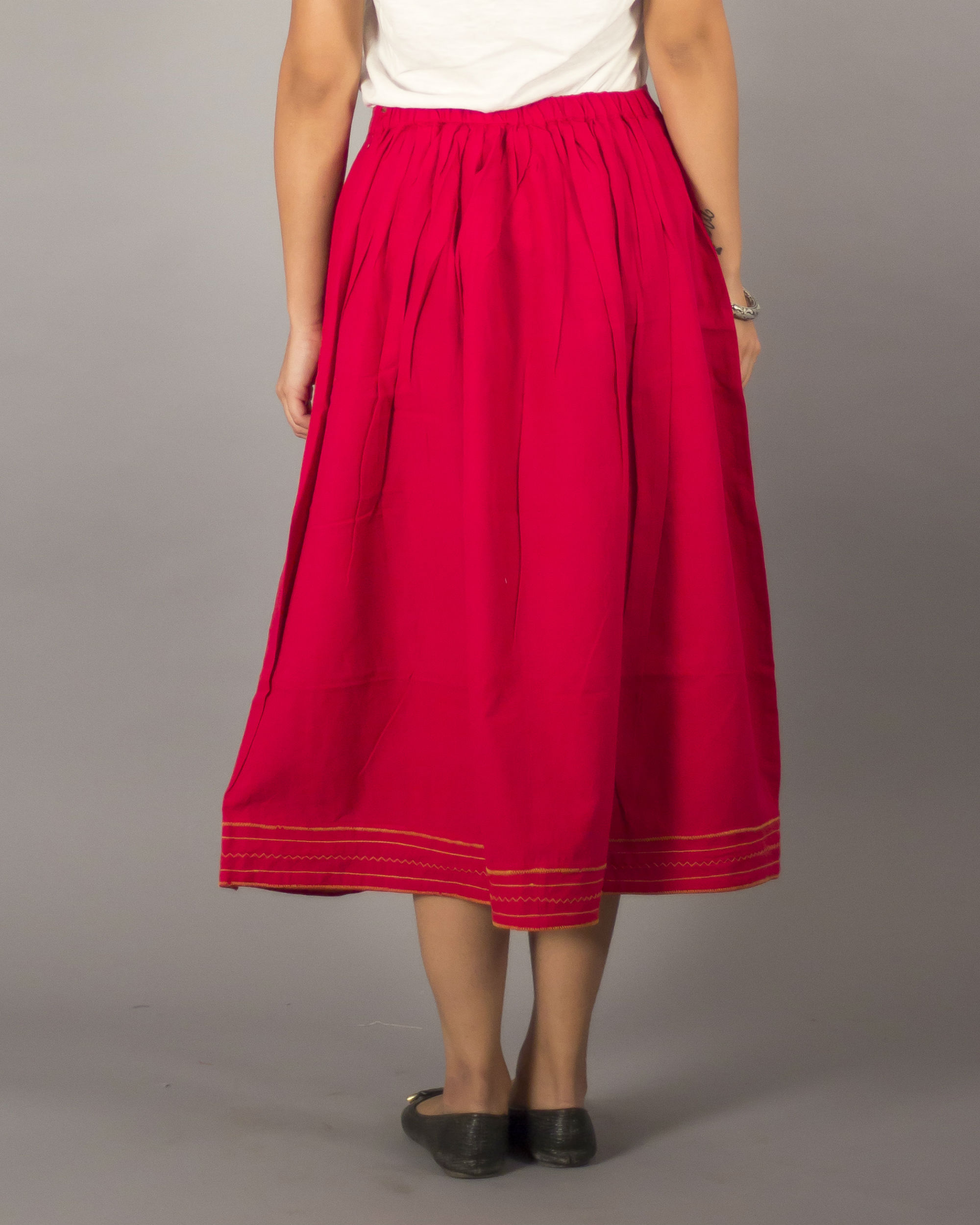 Red pleated skirt by Bebaak The Secret Label