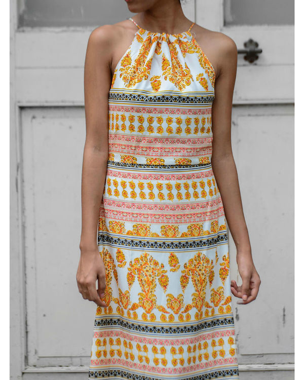 white and yellow attire