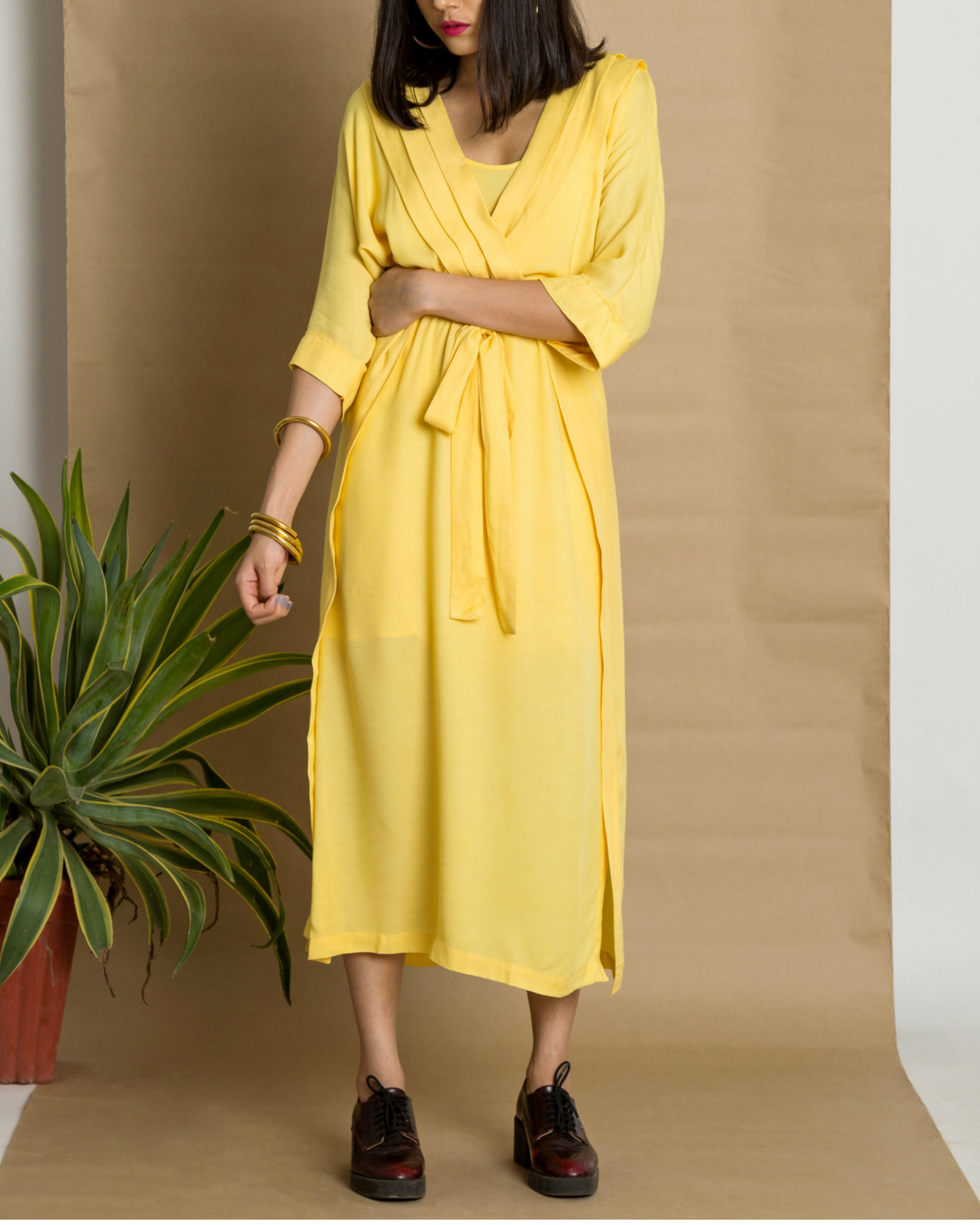 Yellow moss crepe pleated yellow dress by Ritu Jain Singh | The Secret ...