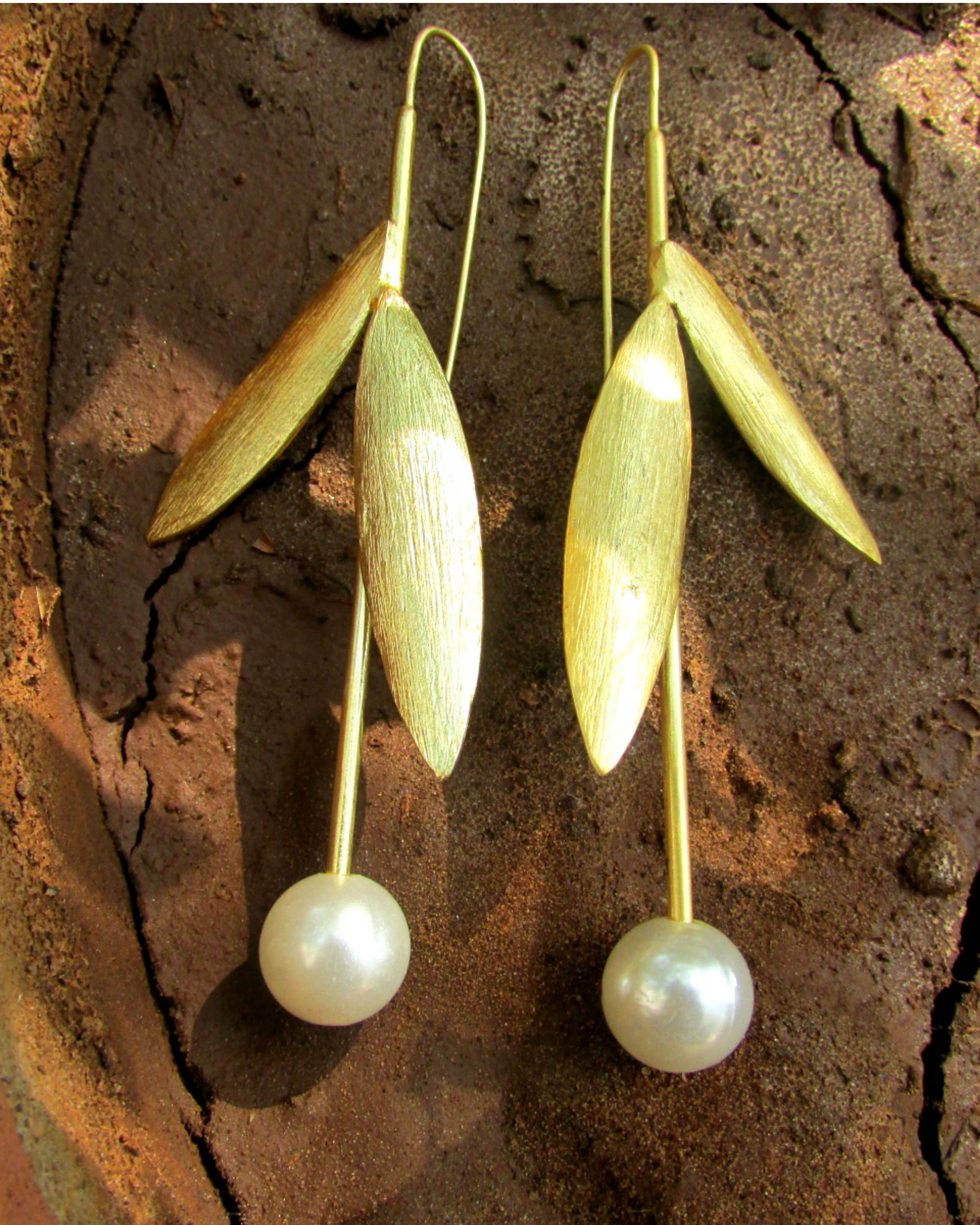 Hanging pearl leaf earrings by AnahikA The Secret Label